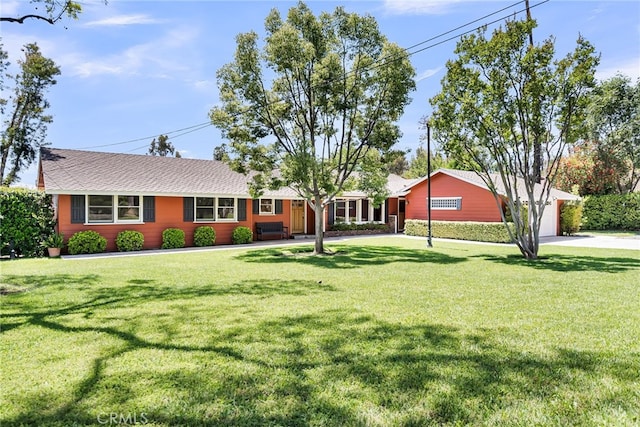 2886 Mcallister St, Riverside, CA 92503 - ranch-style home featuring a front yard, driveway, an attached garage, and roof with shingles