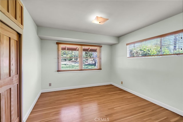 2886 Mcallister St, Riverside, CA 92503 - spare room with light wood finished floors and baseboards