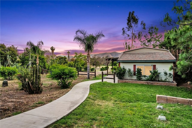 2886 Mcallister St, Riverside, CA 92503 - view of front of home featuring a front lawn and a mountain view