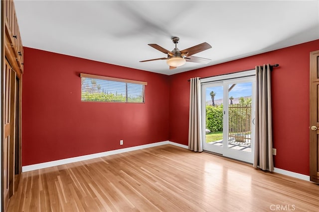 2886 Mcallister St, Riverside, CA 92503 - unfurnished room with plenty of natural light, light wood finished floors, baseboards, and a ceiling fan