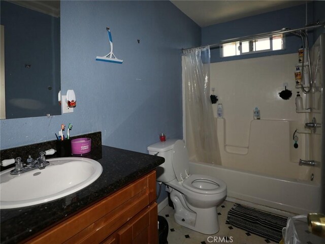 15595 34th Ave, Clearlake, CA 95422 - full bathroom featuring vanity, shower / bath combo with shower curtain, and toilet