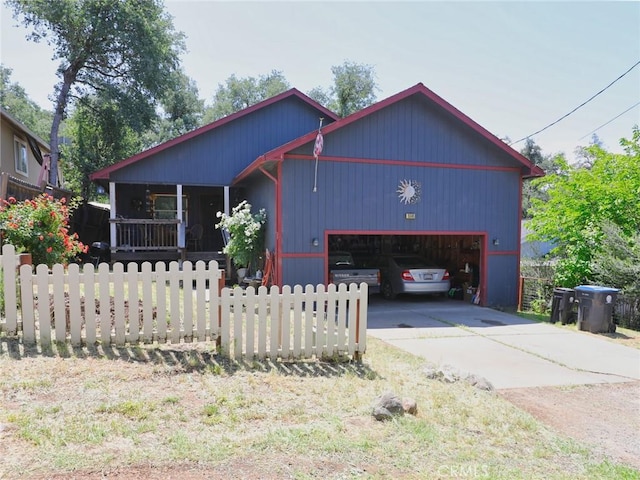 15595 34th Ave, Clearlake, CA 95422 - rustic home featuring a garage and driveway
