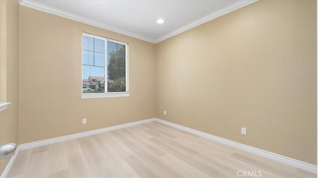 25030 Crimson Lasso Dr, Wildomar, CA 92595 - spare room featuring light wood finished floors, baseboards, ornamental molding, and recessed lighting