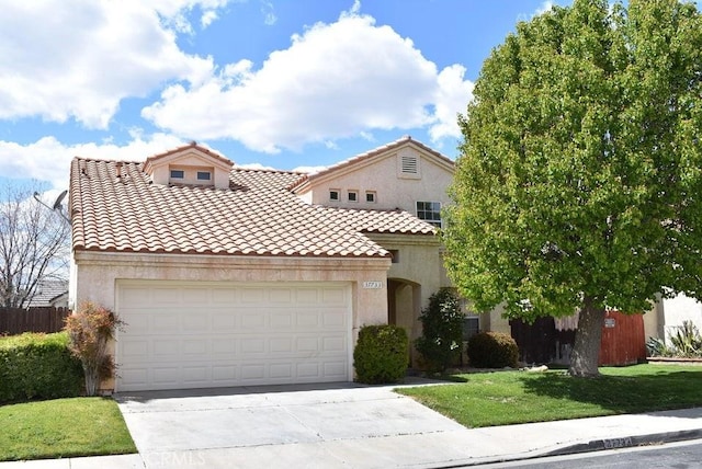 37733 Harvey St, Palmdale, CA 93550 - mediterranean / spanish-style home featuring a tile roof, concrete driveway, an attached garage, and stucco siding