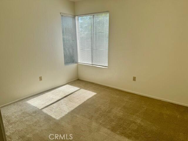 37733 Harvey St, Palmdale, CA 93550 - unfurnished room featuring carpet floors and baseboards