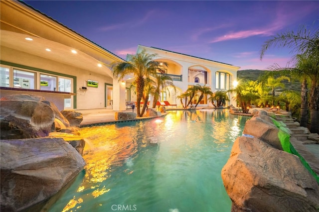 37626 Via Majorca, Murrieta, CA 92562 - pool at dusk featuring a patio area and an outdoor pool
