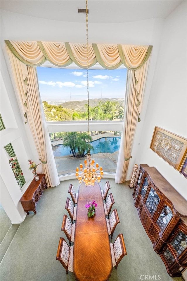 37626 Via Majorca, Murrieta, CA 92562 - carpeted dining area featuring a chandelier