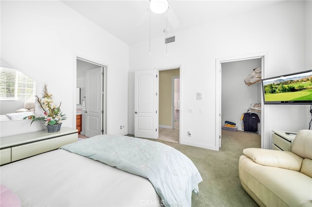 37626 Via Majorca, Murrieta, CA 92562 - bedroom with a spacious closet, light colored carpet, a closet, ensuite bath, and ceiling fan