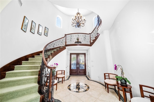 37626 Via Majorca, Murrieta, CA 92562 - entryway with stairway, tile patterned flooring, a high ceiling, a chandelier, and french doors