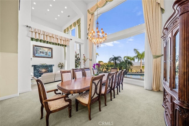 37626 Via Majorca, Murrieta, CA 92562 - dining room with light carpet, plenty of natural light, a chandelier, recessed lighting, and a towering ceiling