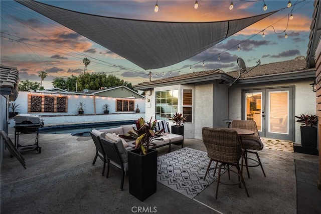 1459 Clock Ave, Redlands, CA 92374 - fenced backyard with a patio area, an outdoor hangout area, and a grill