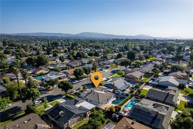 1459 Clock Ave, Redlands, CA 92374 - aerial view of residential area with a mountain backdrop and a pool area