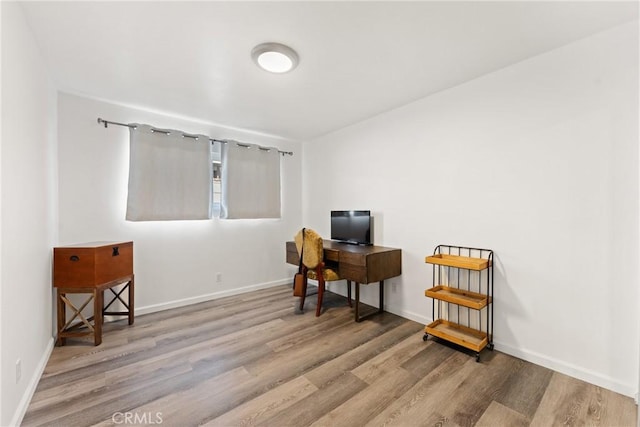 1459 Clock Ave, Redlands, CA 92374 - sitting room featuring wood finished floors and baseboards