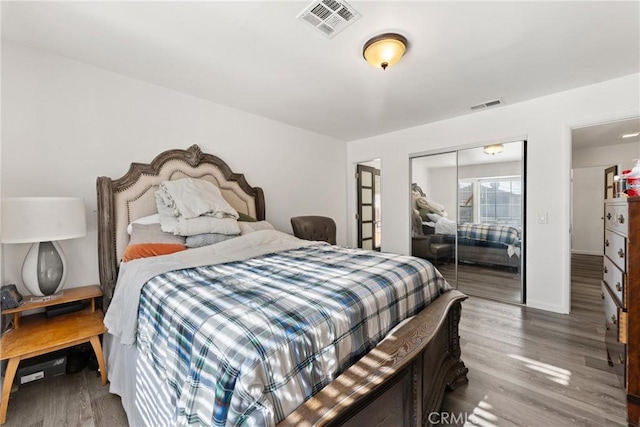 1459 Clock Ave, Redlands, CA 92374 - bedroom featuring wood finished floors, a closet, and baseboards