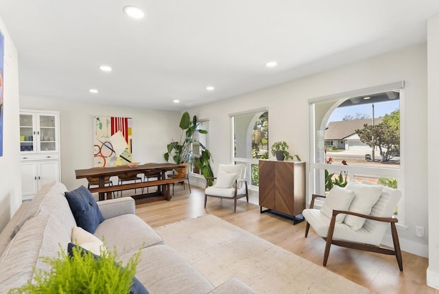 6153 Baltimore Dr, La Mesa, CA 91942 - living room with light wood finished floors and recessed lighting