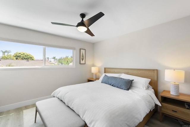 6153 Baltimore Dr, La Mesa, CA 91942 - bedroom with wood finished floors, baseboards, and a ceiling fan