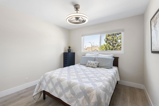 6153 Baltimore Dr, La Mesa, CA 91942 - bedroom featuring wood finished floors and baseboards