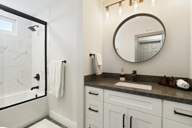 6153 Baltimore Dr, La Mesa, CA 91942 - bathroom featuring vanity, shower / bath combination with glass door, and baseboards