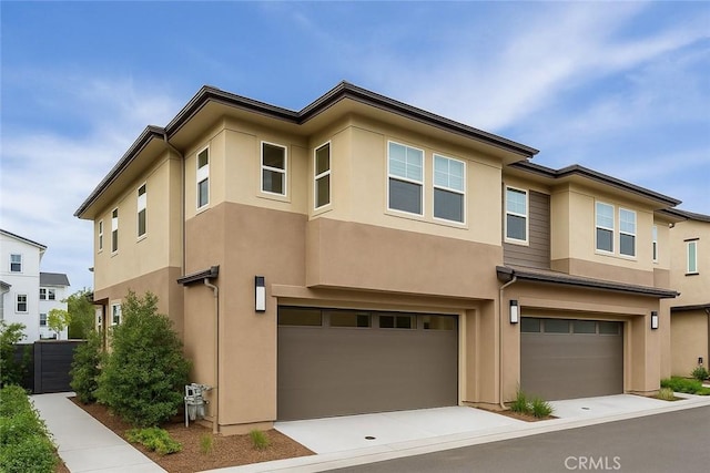 181 Moonflower Rd, Rancho Mission Viejo, CA 92694 - view of front of home with a garage and stucco siding