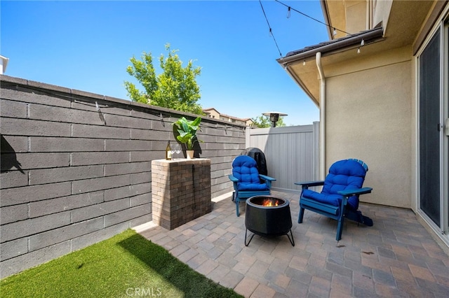 181 Moonflower Rd, Rancho Mission Viejo, CA 92694 - view of patio / terrace with an outdoor fire pit