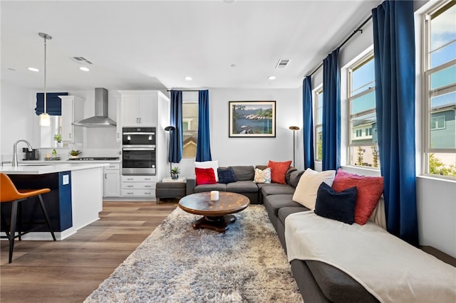 181 Moonflower Rd, Rancho Mission Viejo, CA 92694 - living area with light wood-style floors and recessed lighting