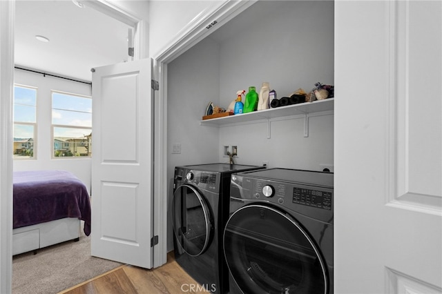 181 Moonflower Rd, Rancho Mission Viejo, CA 92694 - washroom with washer and dryer and light wood-type flooring