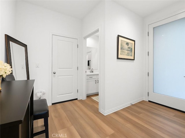 181 Moonflower Rd, Rancho Mission Viejo, CA 92694 - corridor featuring light wood-style floors