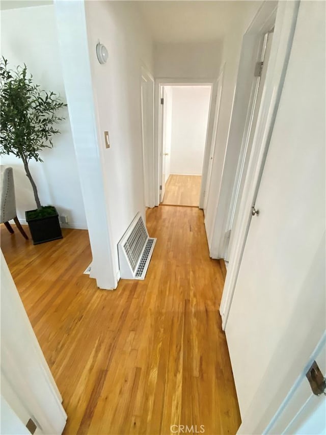 619 Center St, El Segundo, CA 90245 - hallway featuring light wood finished floors