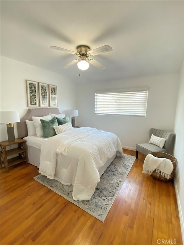 619 Center St, El Segundo, CA 90245 - bedroom with ceiling fan, light wood-style floors, and baseboards