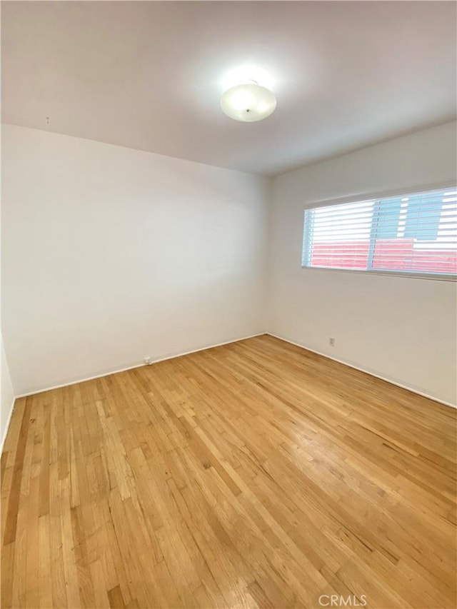 619 Center St, El Segundo, CA 90245 - empty room featuring light wood finished floors