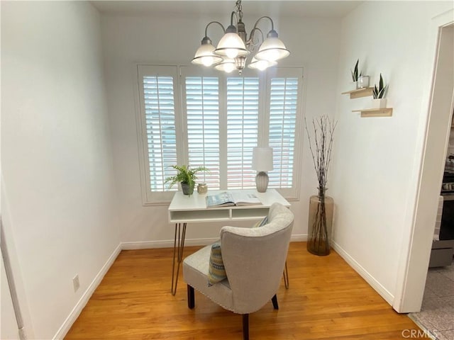 619 Center St, El Segundo, CA 90245 - home office featuring a chandelier, plenty of natural light, and light wood finished floors