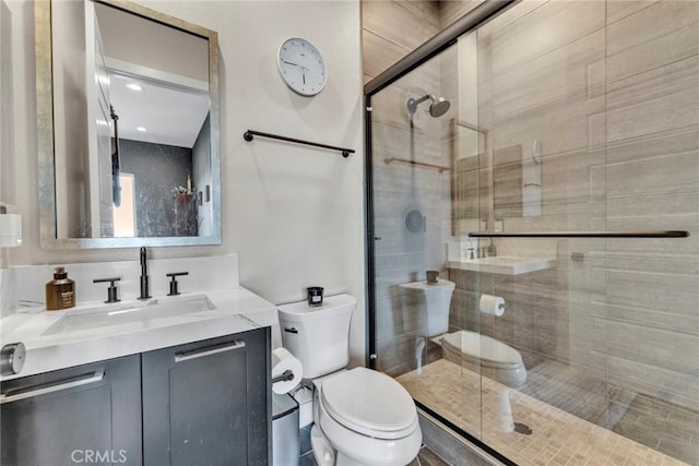 20537 W Overlook Ct, Porter Ranch, CA 91326 - full bathroom featuring toilet, vanity, and a stall shower