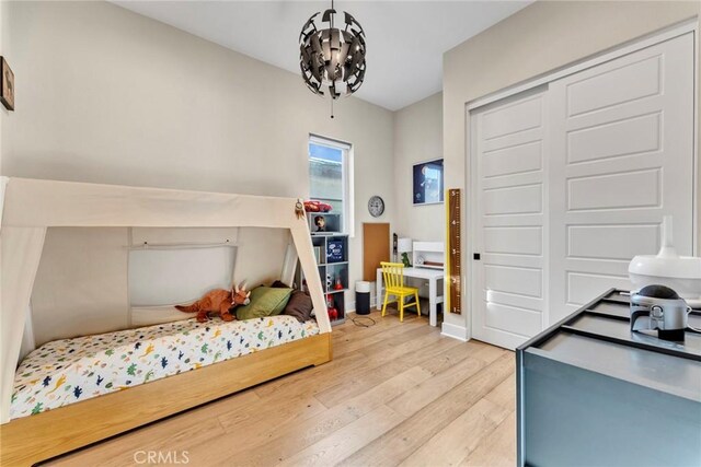 20537 W Overlook Ct, Porter Ranch, CA 91326 - bedroom with wood finished floors and a closet