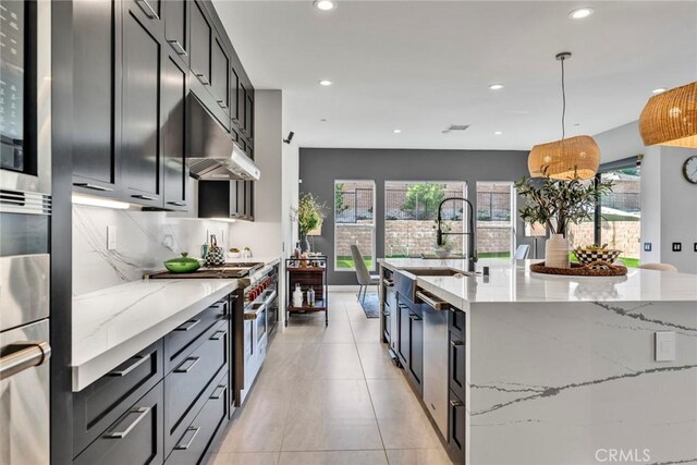 20537 W Overlook Ct, Porter Ranch, CA 91326 - kitchen with double oven range, recessed lighting, light stone counters, pendant lighting, and a large island