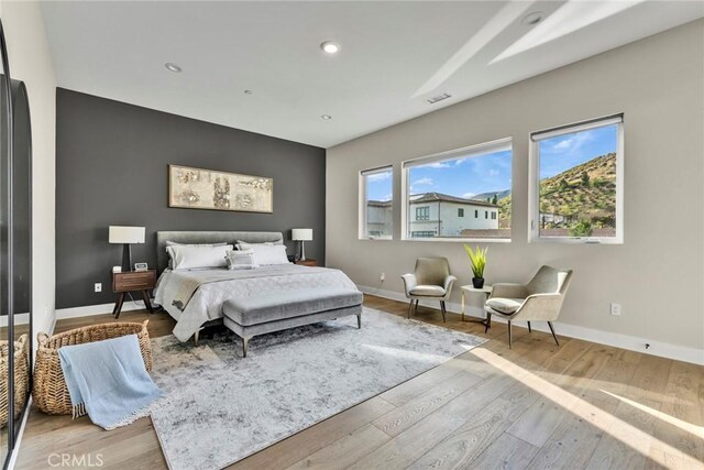 20537 W Overlook Ct, Porter Ranch, CA 91326 - bedroom with baseboards, wood finished floors, and recessed lighting