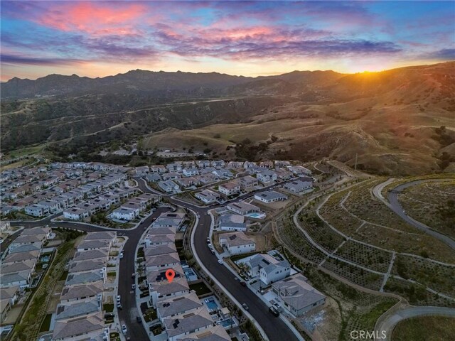 20537 W Overlook Ct, Porter Ranch, CA 91326 - aerial view at dusk of a mountain view and a residential view