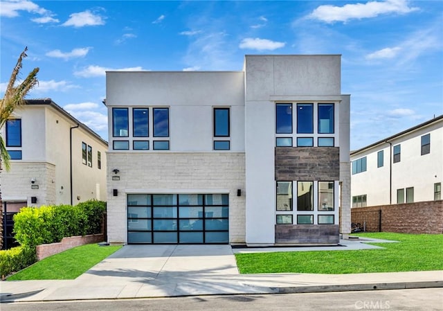20537 W Overlook Ct, Porter Ranch, CA 91326 - modern home with driveway, a garage, and stone siding