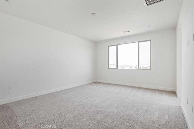 17744 Mcdowell Valley Dr, Riverside, CA 92503 - spare room featuring light colored carpet and baseboards