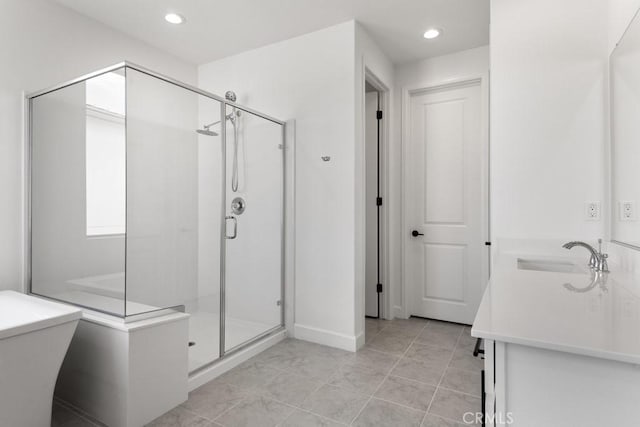 17744 Mcdowell Valley Dr, Riverside, CA 92503 - full bathroom featuring a shower stall, vanity, recessed lighting, baseboards, and tile patterned flooring
