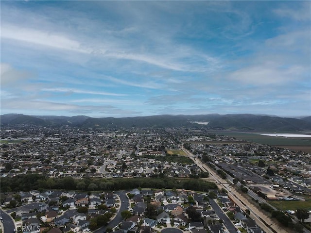 1337 Lloyd Pl, Lompoc, CA 93436 - aerial view of property and surrounding area featuring a mountainous background and nearby suburban area