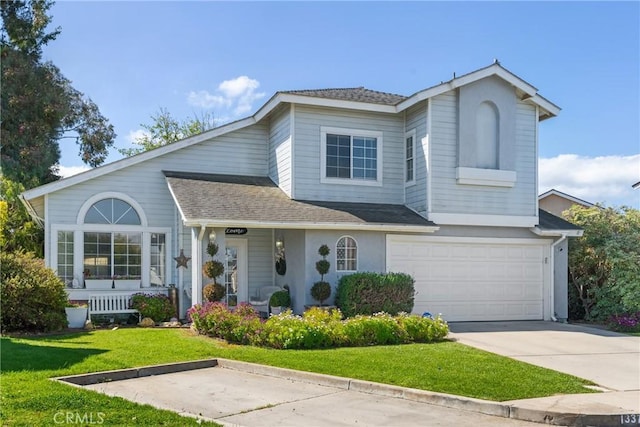 1337 Lloyd Pl, Lompoc, CA 93436 - traditional-style house featuring an attached garage, concrete driveway, a front lawn, roof with shingles, and covered porch
