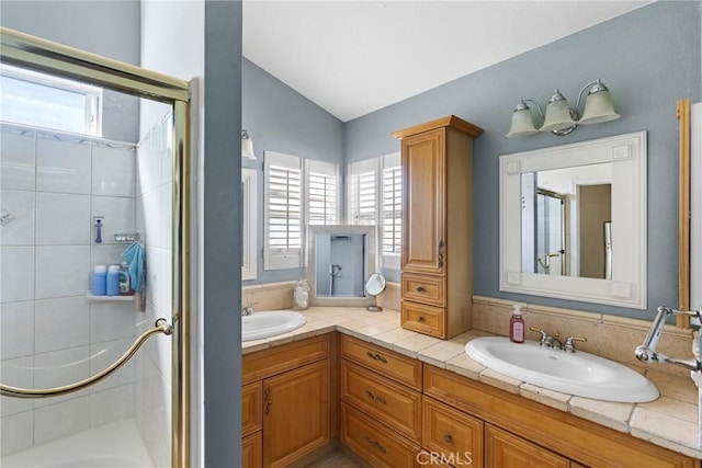 1337 Lloyd Pl, Lompoc, CA 93436 - full bath featuring a shower with shower door, double vanity, and lofted ceiling