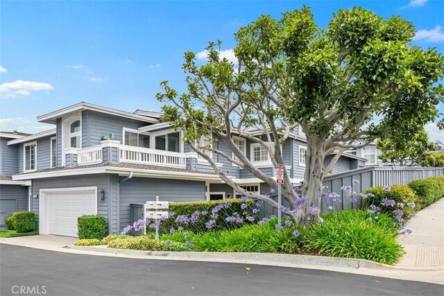 3510 Lilac Ave Unit 13, Corona Del Mar, CA 92625 - view of front facade featuring a balcony and a garage