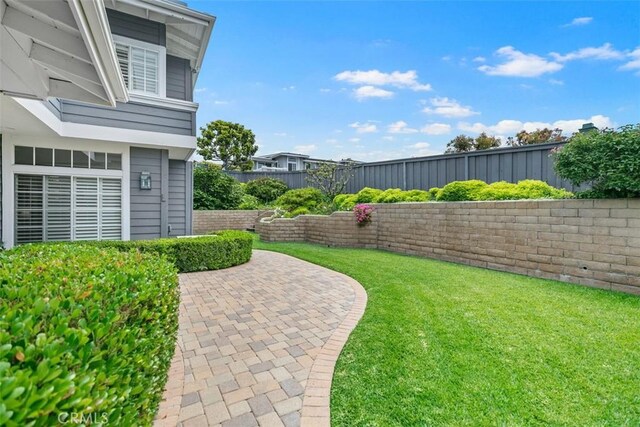 3510 Lilac Ave Unit 13, Corona Del Mar, CA 92625 - fenced backyard featuring a patio