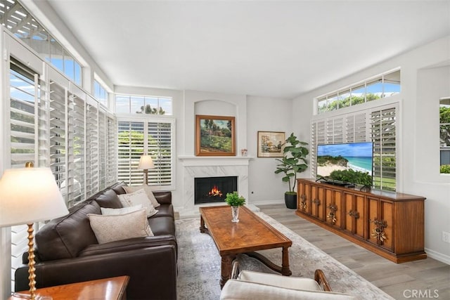 3510 Lilac Ave Unit 13, Corona Del Mar, CA 92625 - living area with wood finished floors, plenty of natural light, and a high end fireplace
