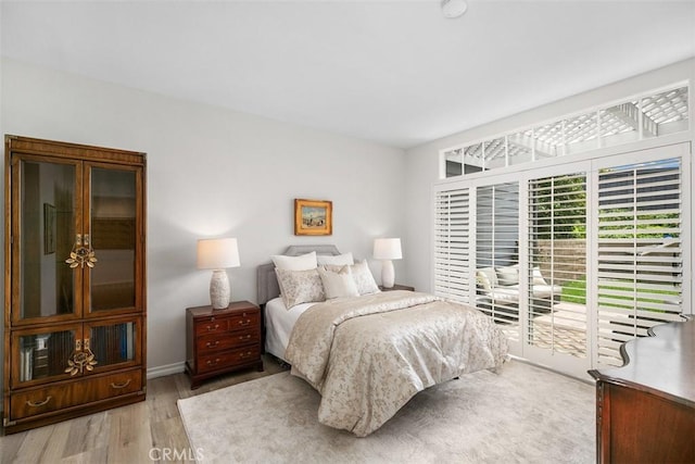 3510 Lilac Ave Unit 13, Corona Del Mar, CA 92625 - bedroom featuring wood finished floors and access to exterior
