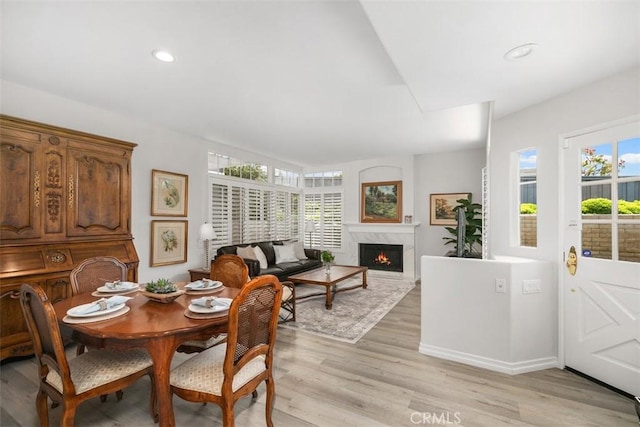 3510 Lilac Ave Unit 13, Corona Del Mar, CA 92625 - dining room with a fireplace, light wood-style floors, and recessed lighting