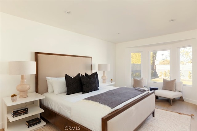 3554 S Sycamore Ave, Los Angeles, CA 90016 - bedroom with light wood-style flooring and baseboards