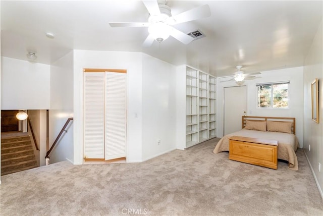4899 Glenwood Dr, Riverside, CA 92501 - carpeted bedroom featuring baseboards and ceiling fan