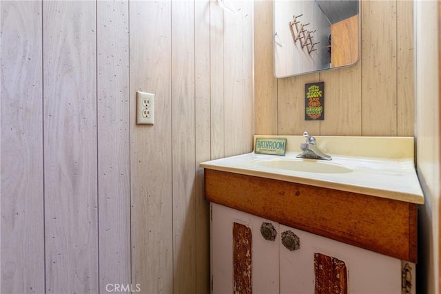 4899 Glenwood Dr, Riverside, CA 92501 - bathroom featuring vanity and wooden walls